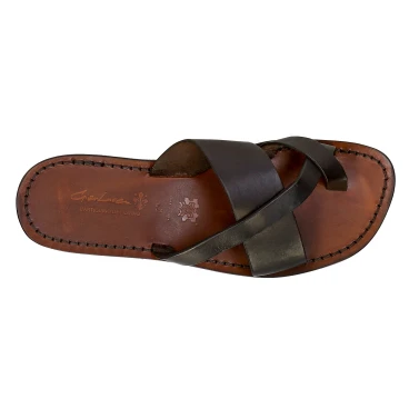 Handmade brown leather thongs braid around the big toe and leather sole