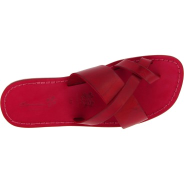 Red leather thongs braid around the big toe and leather sole