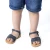 Child's gladiator braided sandals in blue nubuck leather with buckle closure