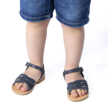 Child's gladiator braided sandals in blue nubuck leather with buckle closure