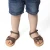 Sandali intrecciati gladiatore da bambino in pelle nubuck marrone chiusura con fibbia