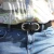 Handmade black leather belt with metal figure eight buckle