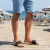 Handmade men's wooden clog slippers with adjustable black leather band